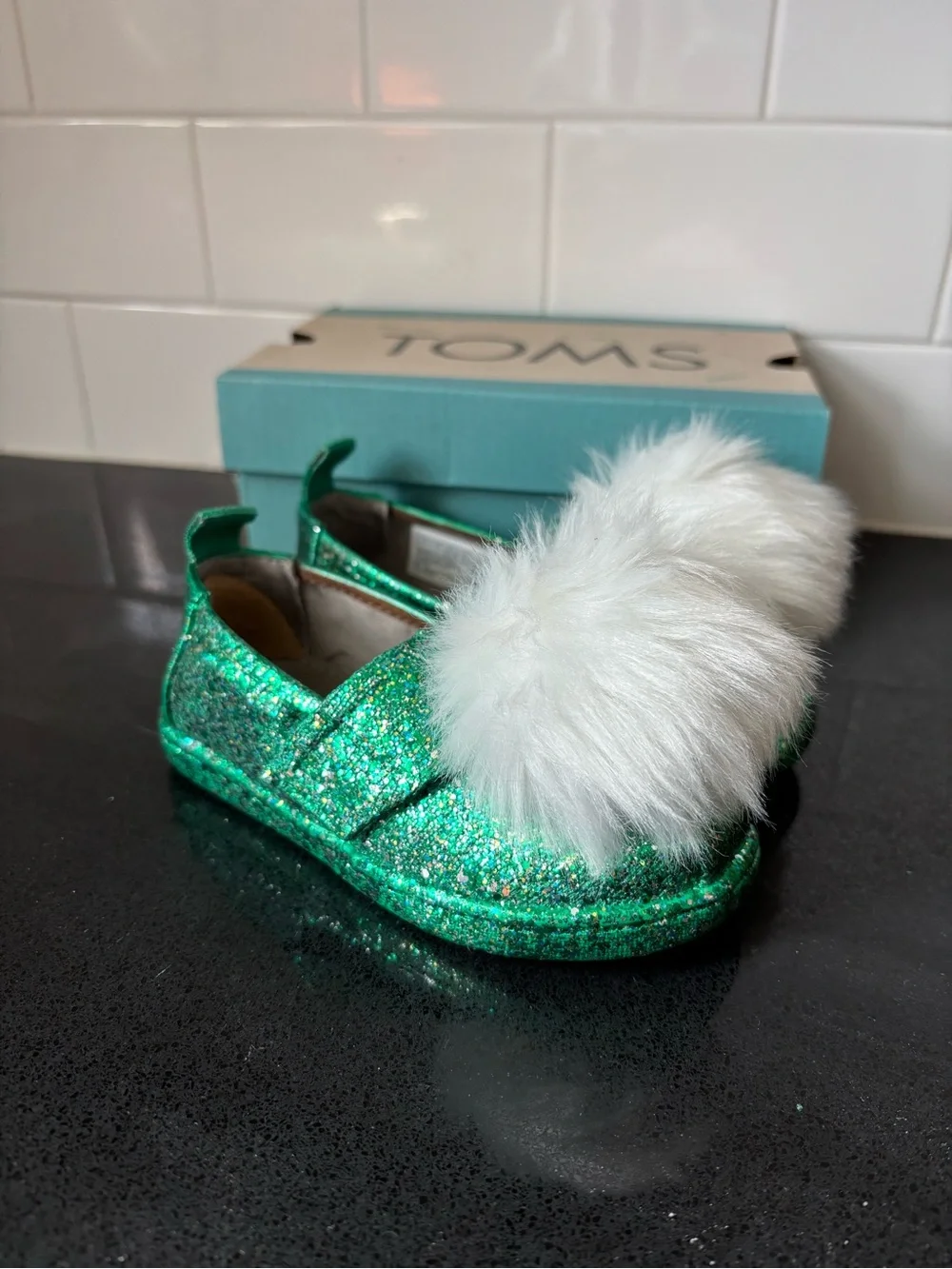 Toms Kids Green Glitter Slip-On Moccasins with White Pom